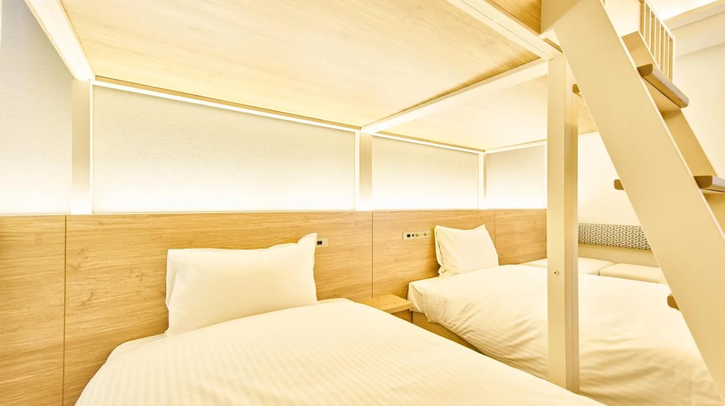 a laundry room with a washer and dryer at 2026年7月New Open! Grand STAY Hakata Nishinakasu in Fukuoka
