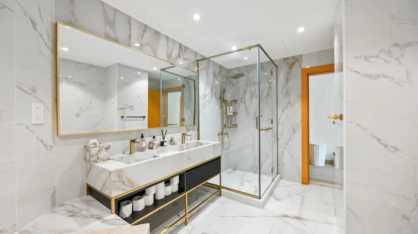 a bathroom with a sink and a shower at 2BDR Luxury Apartment in Palm in Dubai