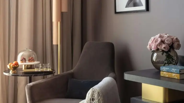a microphone on a tripod next to a wall at Anantara Plaza Nice Hotel - A Leading Hotel of the World in Nice