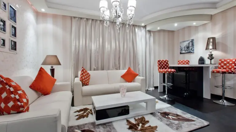 a living room with a white couch and a table at Art Palace Suites & Spa in Casablanca