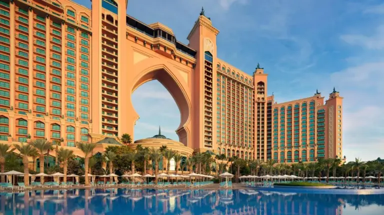 a living room with a couch and a table at Atlantis