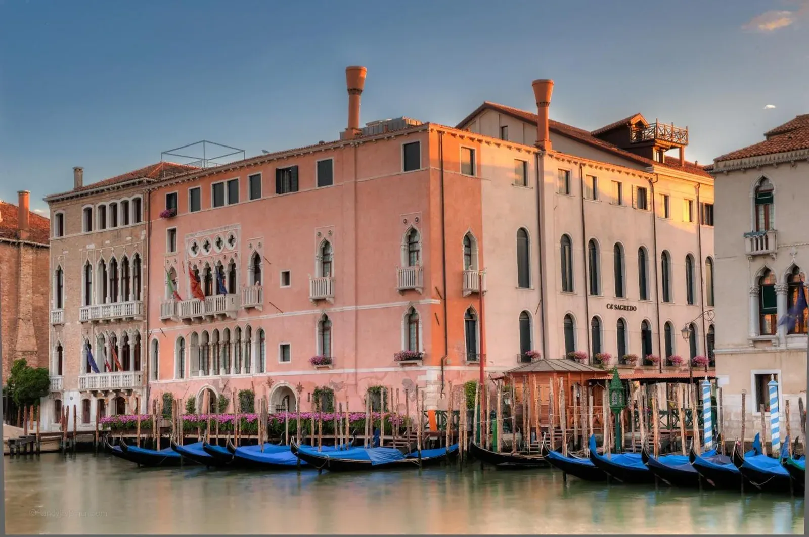 Exterior view of Ca' Sagredo Hotel in Venice, showcasing its historic architecture