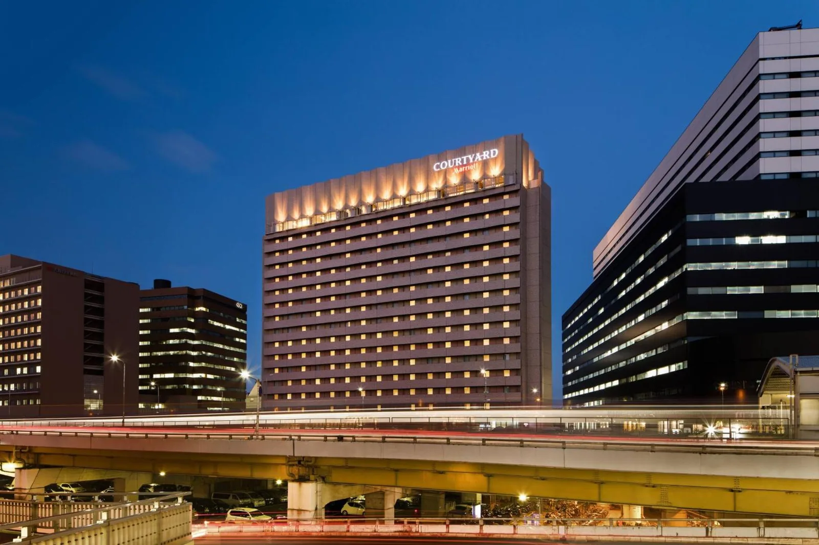 Courtyard by Marriott Shin-Osaka Station exterior view at night