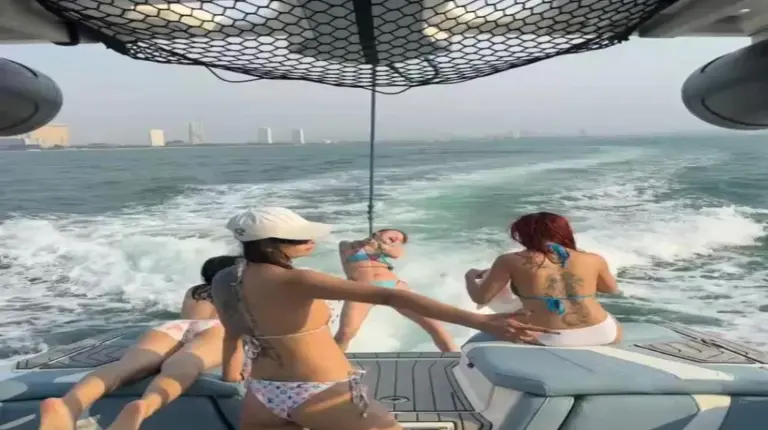 a group of people on a boat in the water at Downtown Oasis 芭提雅市中心独栋泳池别墅 A 5卧6卫 KTV BBQ 芭提雅海滩步行街500m in Pattaya South