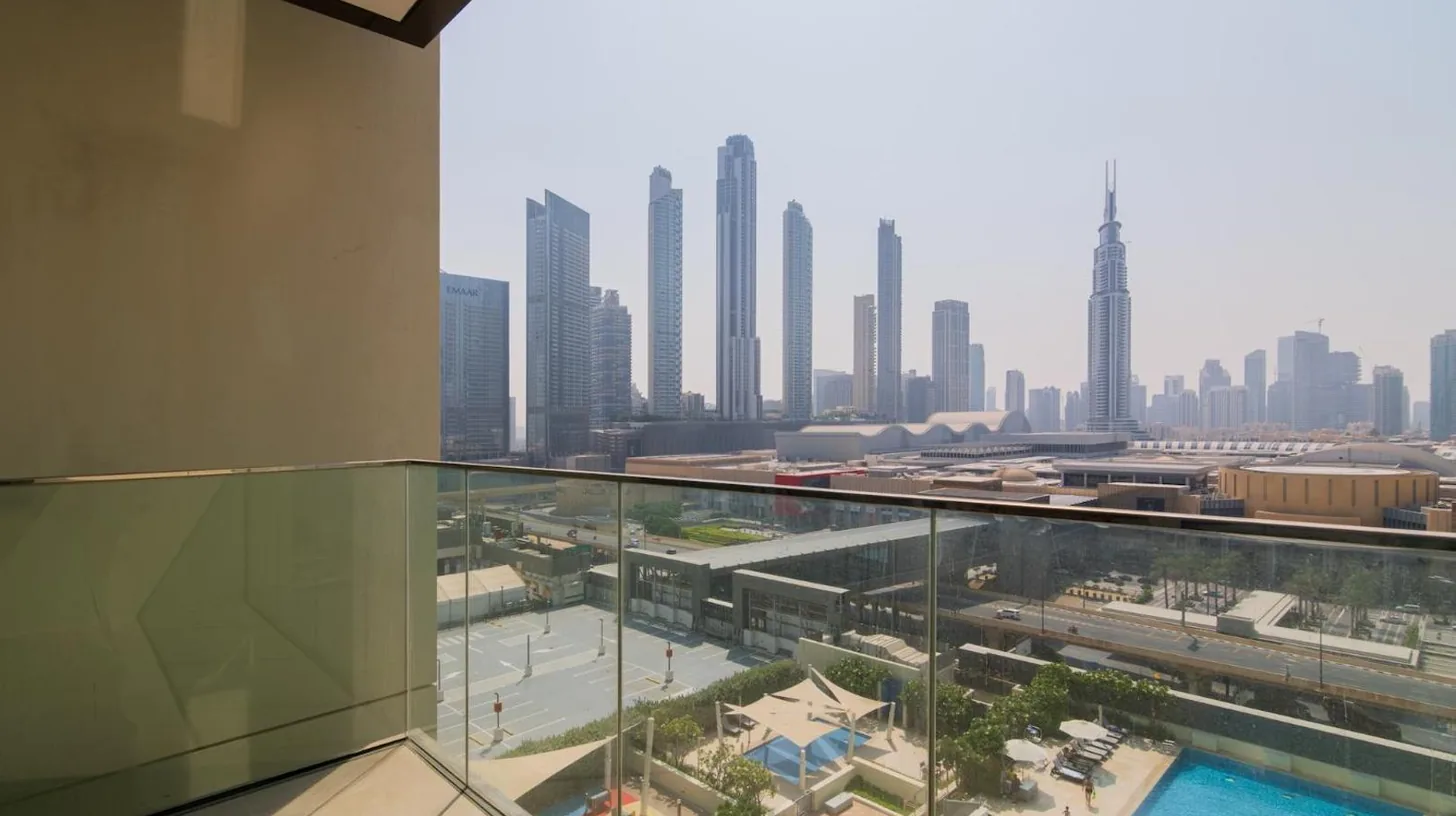 a view of a city skyline from a building at Elite Escape Holiday Home - 2 BHK Getaway with Burj Khalifa View and Dubai Mall Access - 1507 in Dubai