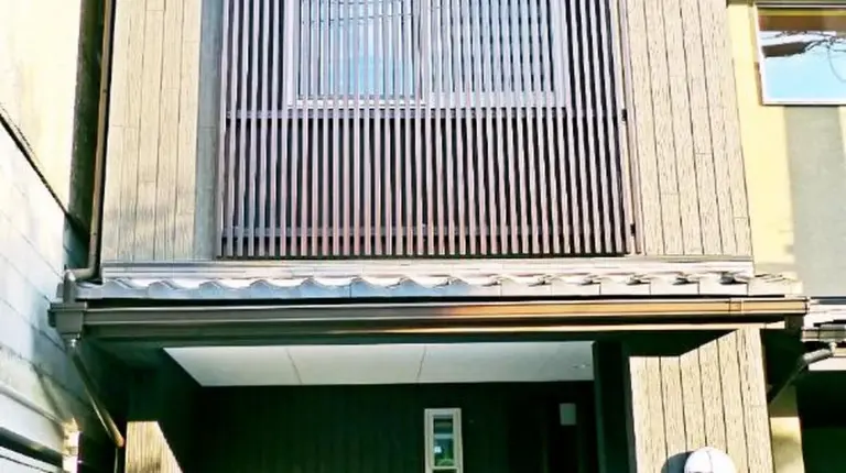 a building with a stairway leading up to it at EnSe Kiyomizu Villa in Kyoto