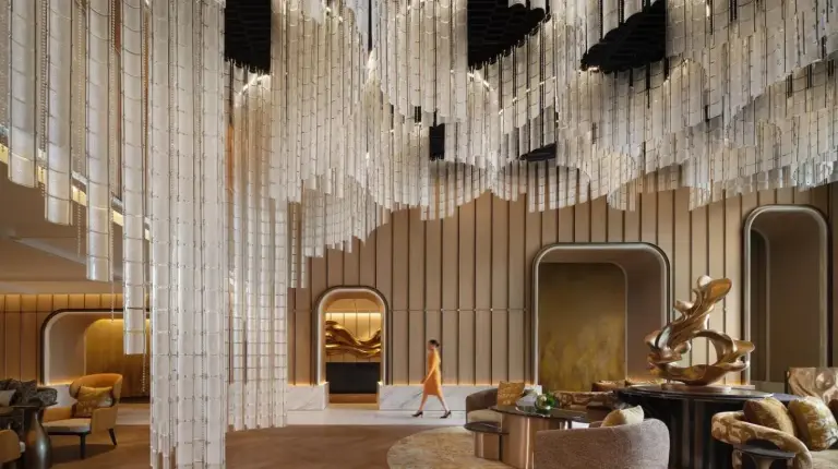 a rendering of a lobby with a large wall of mirrors at Fairmont Bangkok Sukhumvit in Bangkok
