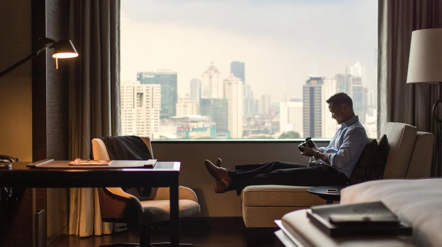 a park with a city skyline in the background at Fairmont Jakarta in Jakarta