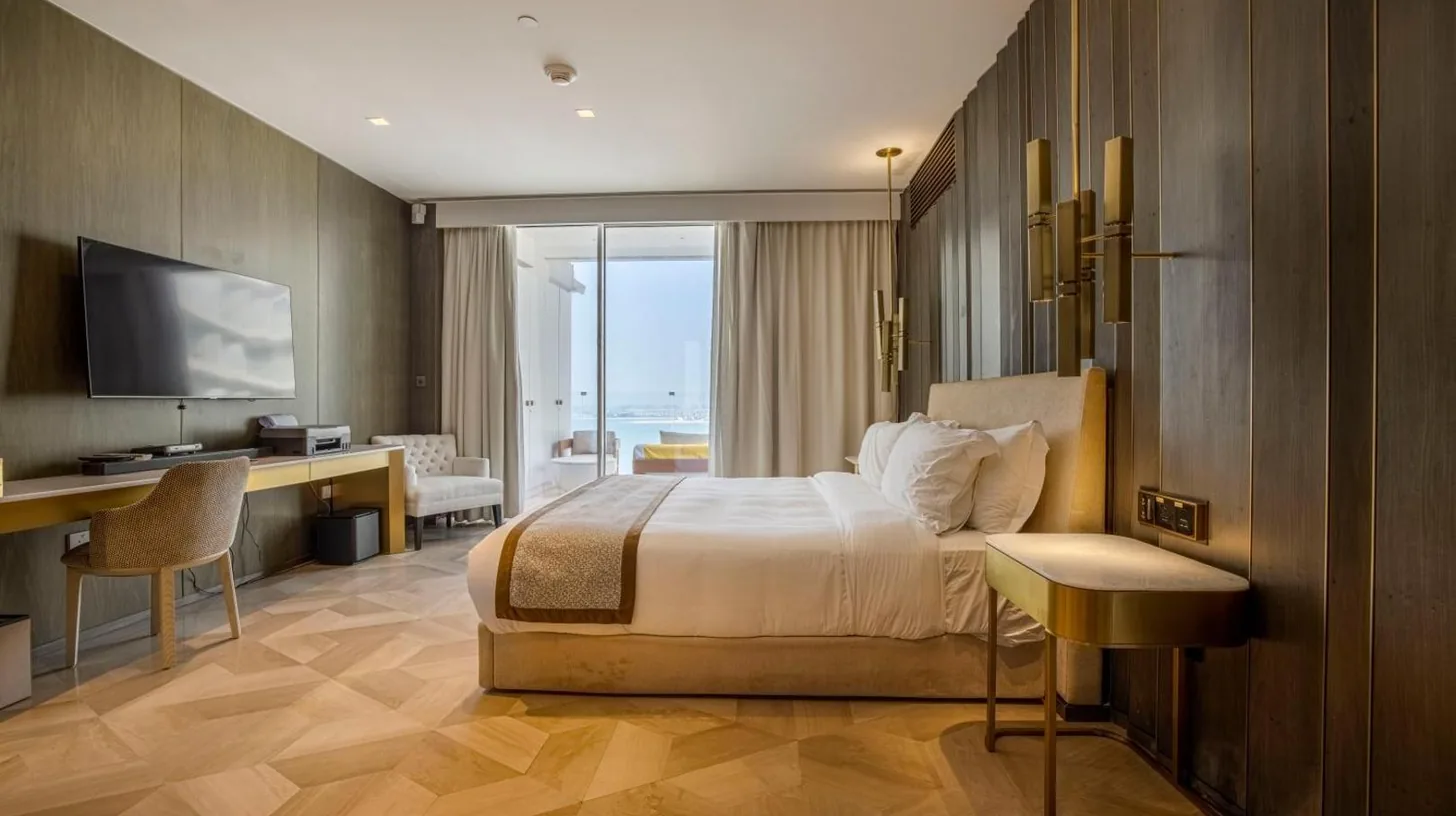 a living room with white furniture and a view of the city at FIVE Palm Jumeirah 2BR Luxury Penthouse