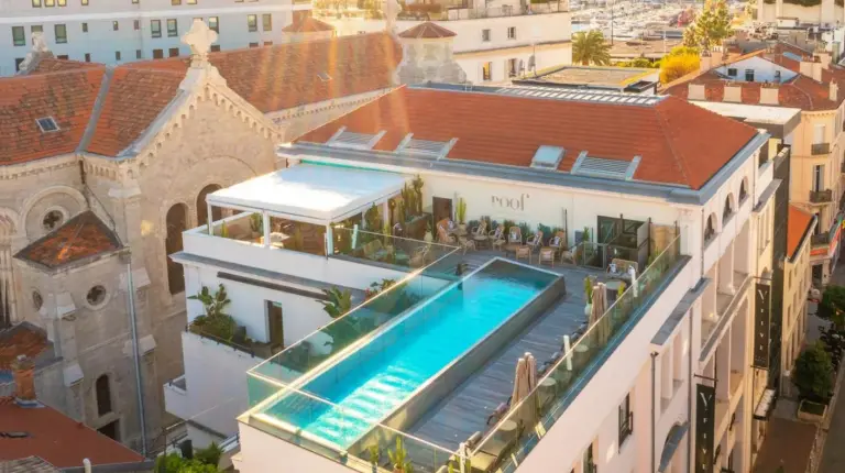 an aerial view of a building with a swimming pool at Five Seas by Inwood Hotels in Cannes