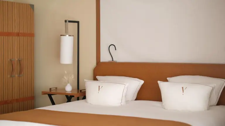 a white sink on a black counter in a bathroom at Five Seas by Inwood Hotels in Cannes