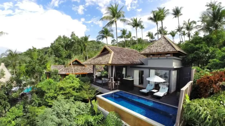 an aerial view of a villa with a swimming pool at Four Seasons Resort Koh Samui in Mae Nam