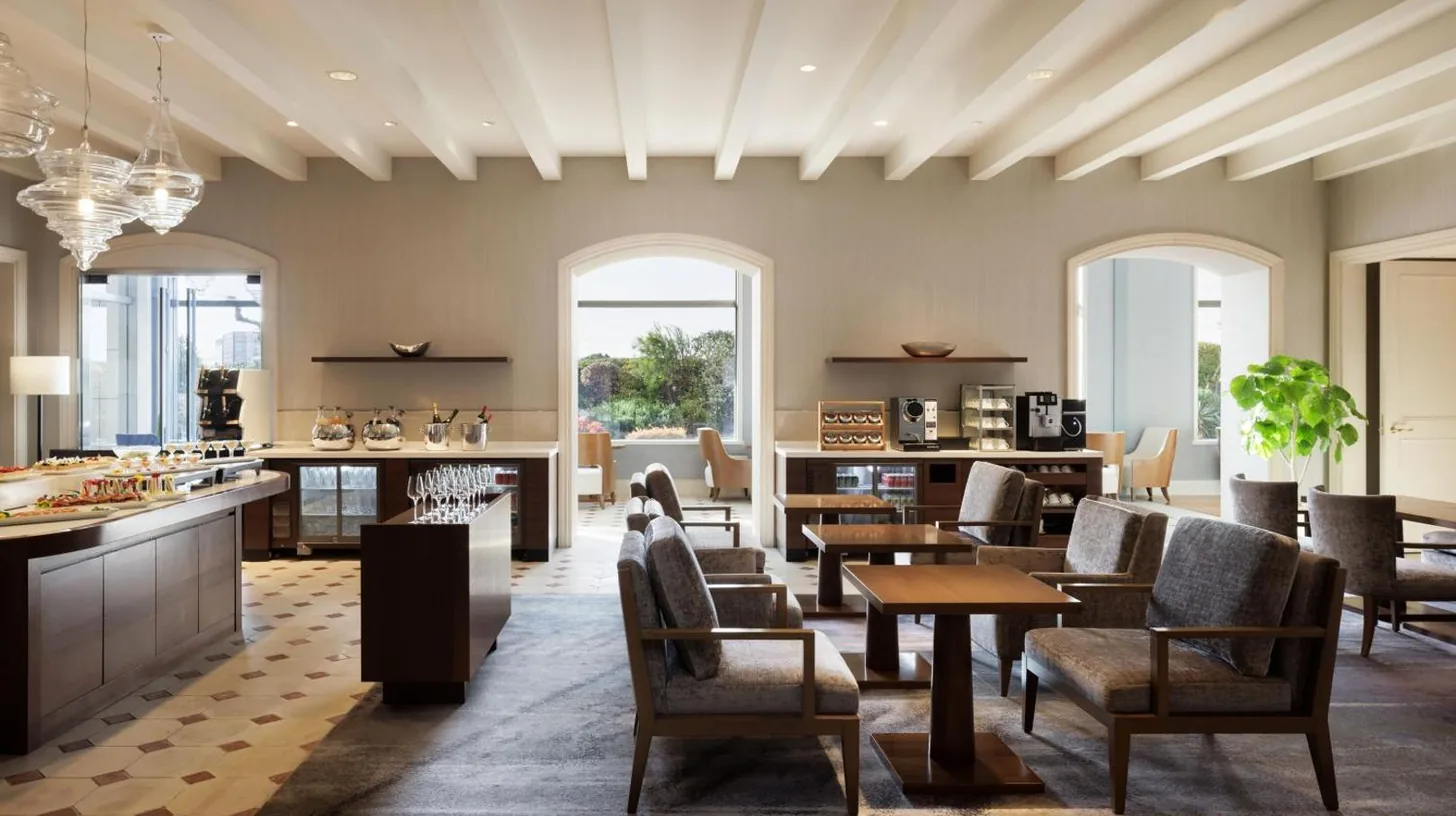 a living room with couches and a table at Grand Nikko Tokyo Daiba in Tokyo
