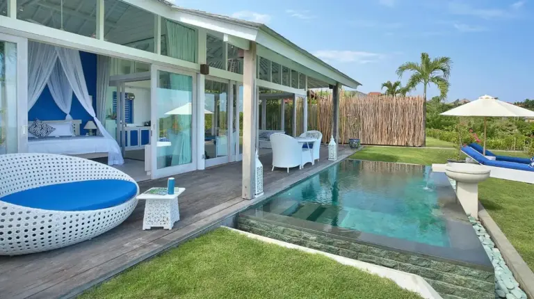 a house with a swimming pool in the yard at Hidden Hills Villas - Small Luxury Hotels of The World in Uluwatu