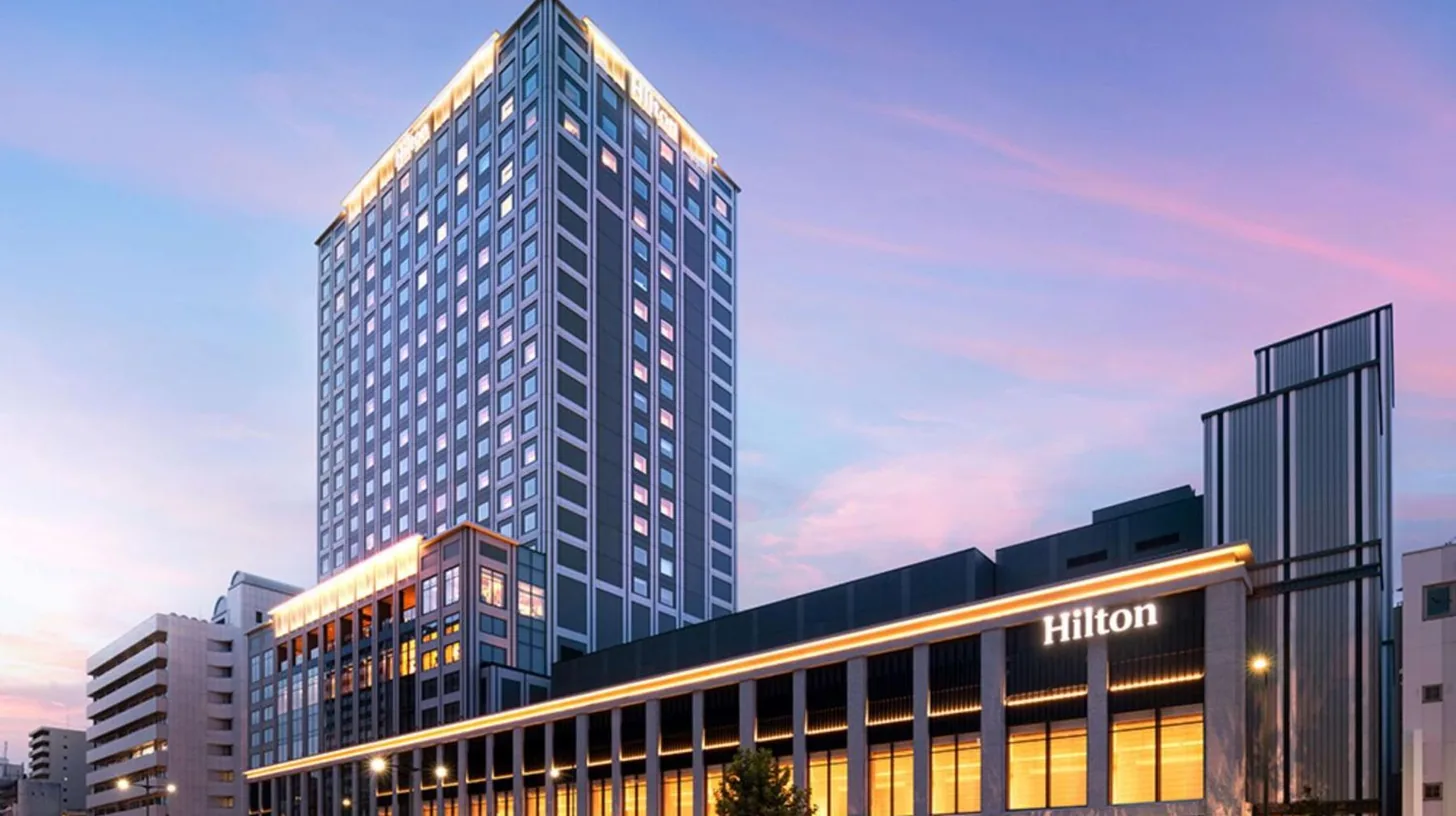 a tall building with a lot of windows at Hilton Hiroshima in Hiroshima