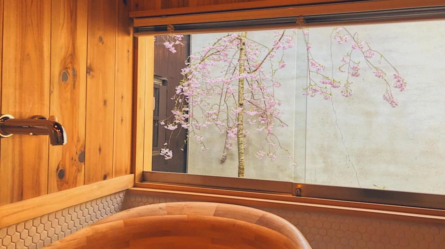 a window with a picture of a tree at Casa OGUMO in Kyoto