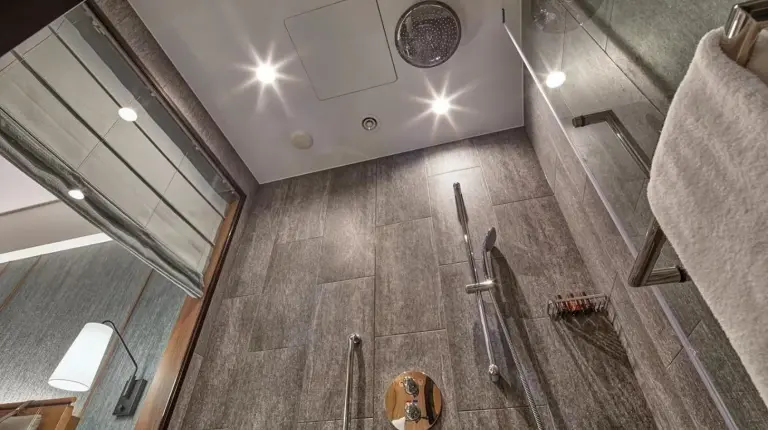 an overhead view of a bathroom with a shower at Hotel Collective in Naha