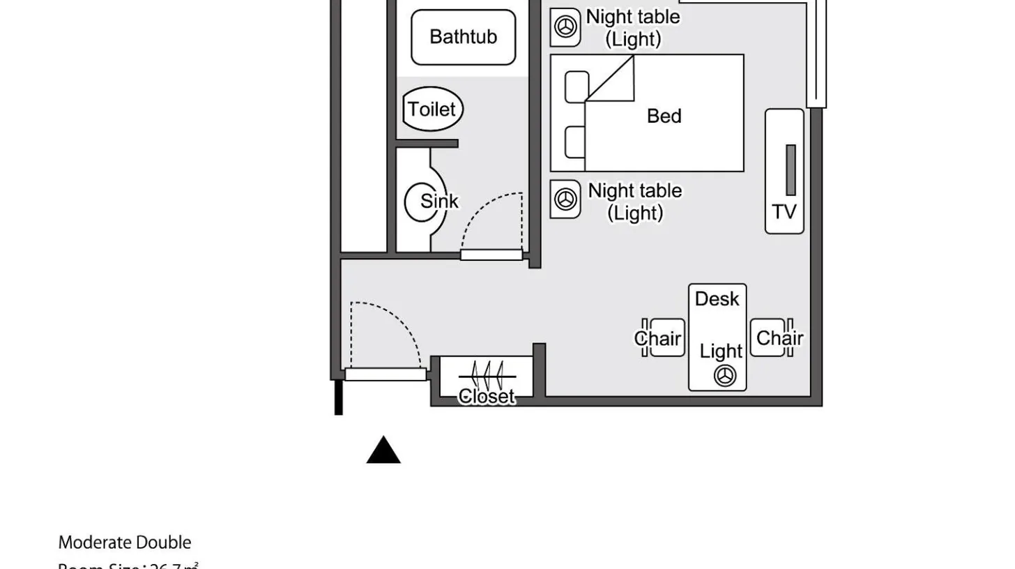 a hotel room with a large bed and a desk at Hotel Hankyu International in Osaka