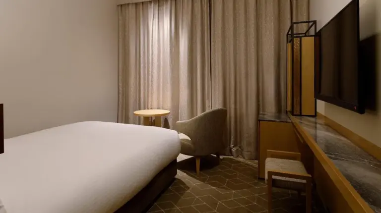 a large white bed in a hotel room at Hotel The Celestine Tokyo Shiba in Tokyo