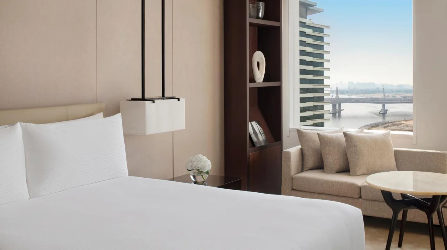 a large white bed in a hotel room at InterContinental Dubai Festival City by IHG in Dubai