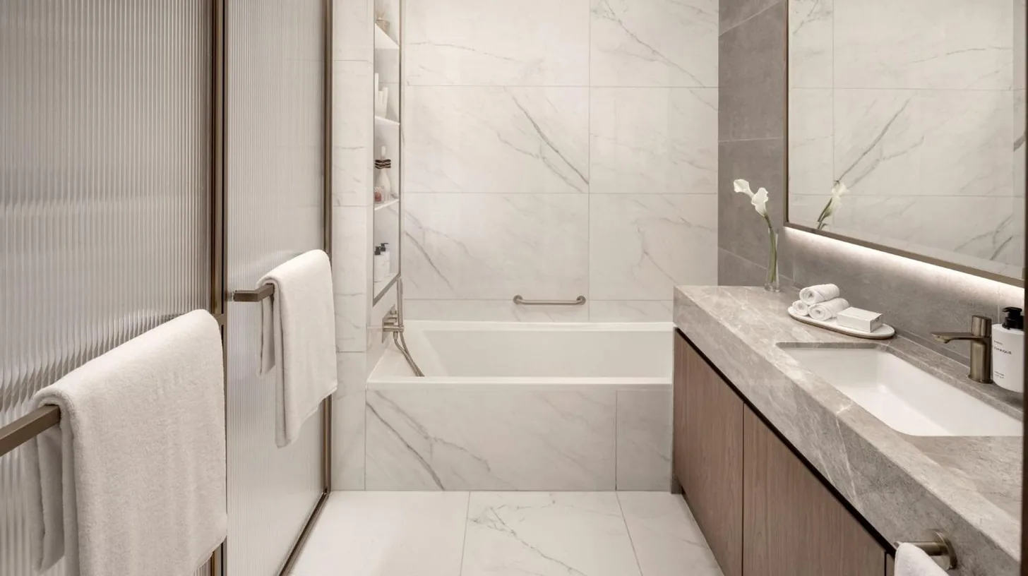 a white bathroom with a tub and a sink at InterContinental Residences Dubai Business Bay by IHG in Dubai