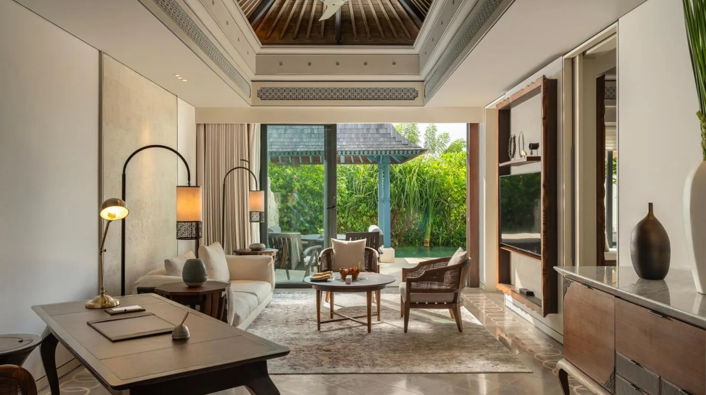 a bathroom with a bath tub and a sink at Jumeirah Bali in Uluwatu