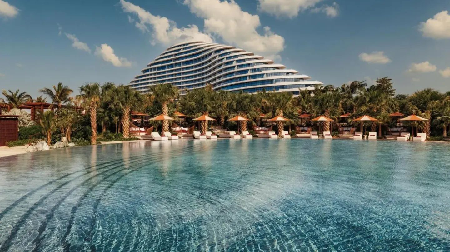 a large swimming pool with a building in the background at Jumeirah Marsa Al Arab Dubai in Dubai