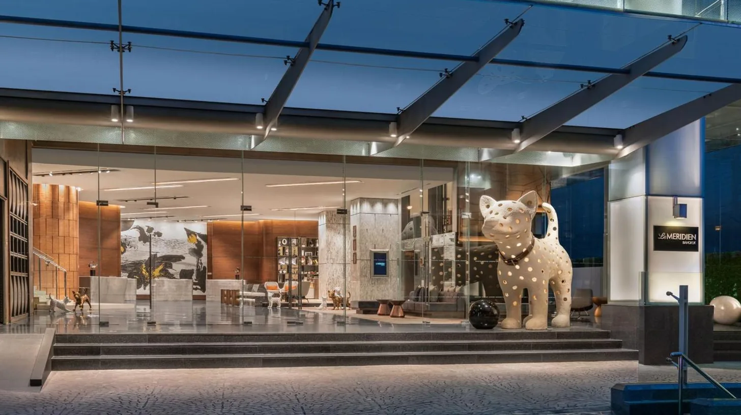 a museum with a statue of a cow on display at Le Meridien Bangkok in Bangkok