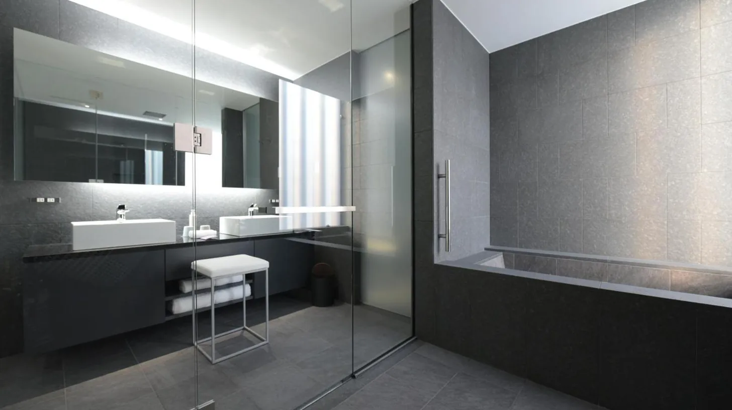 a bathroom with two sinks and a mirror at MOGANA in Kyoto