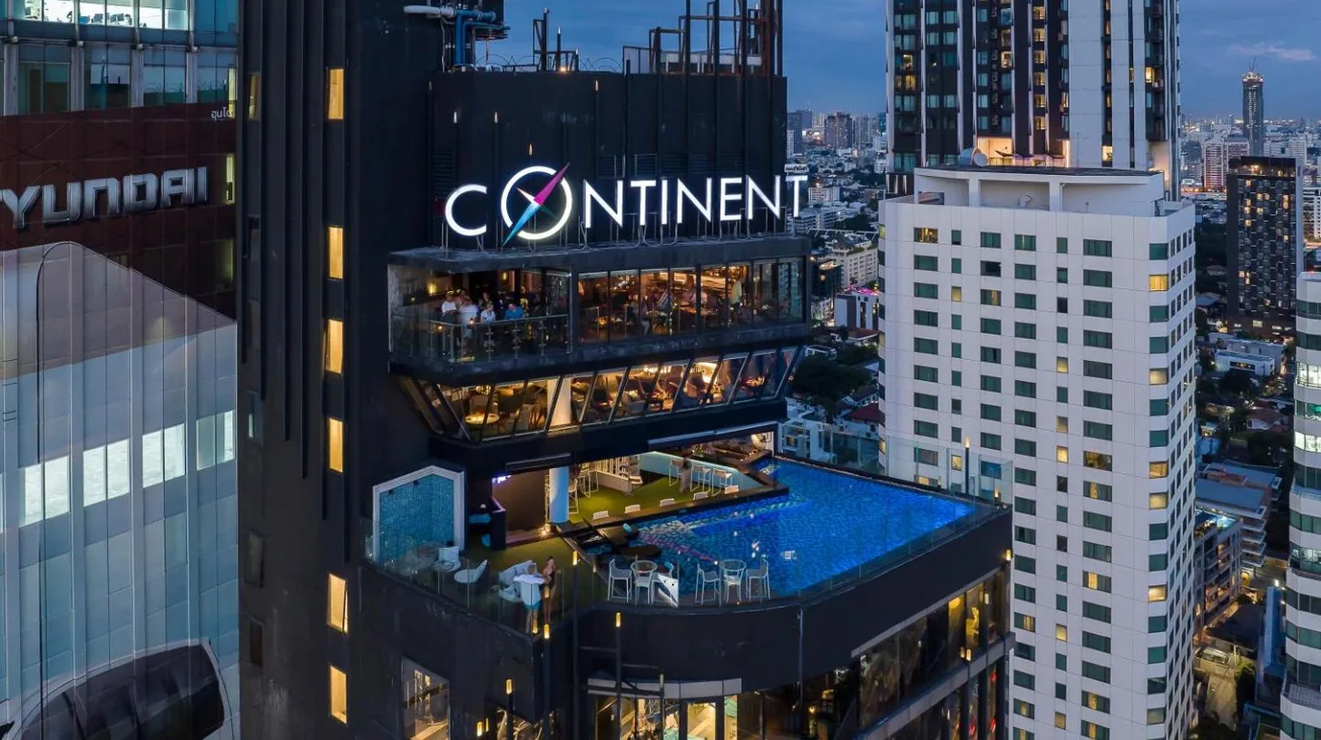 a view of a building with a sign on it at Montraj Continent Sukhumvit Bangkok in Bangkok