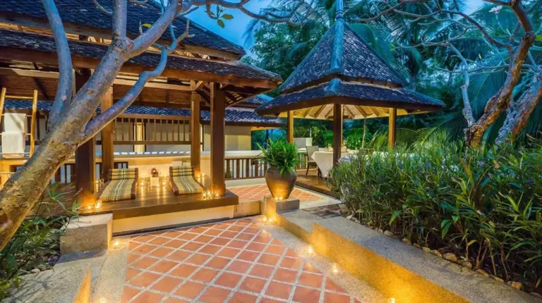 an outdoor patio with a gazebo and a brick path at Muang Samui Spa Resort in Chaweng