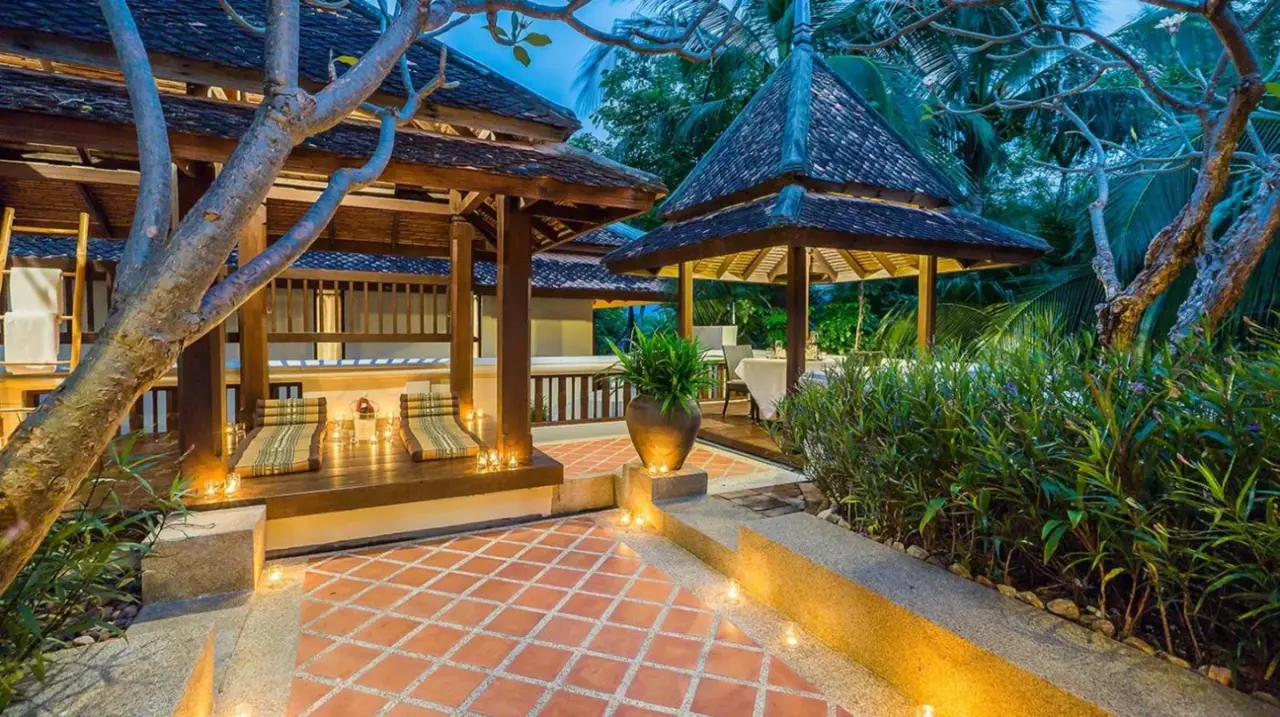 an outdoor patio with a gazebo and a brick path at Muang Samui Spa Resort in Chaweng