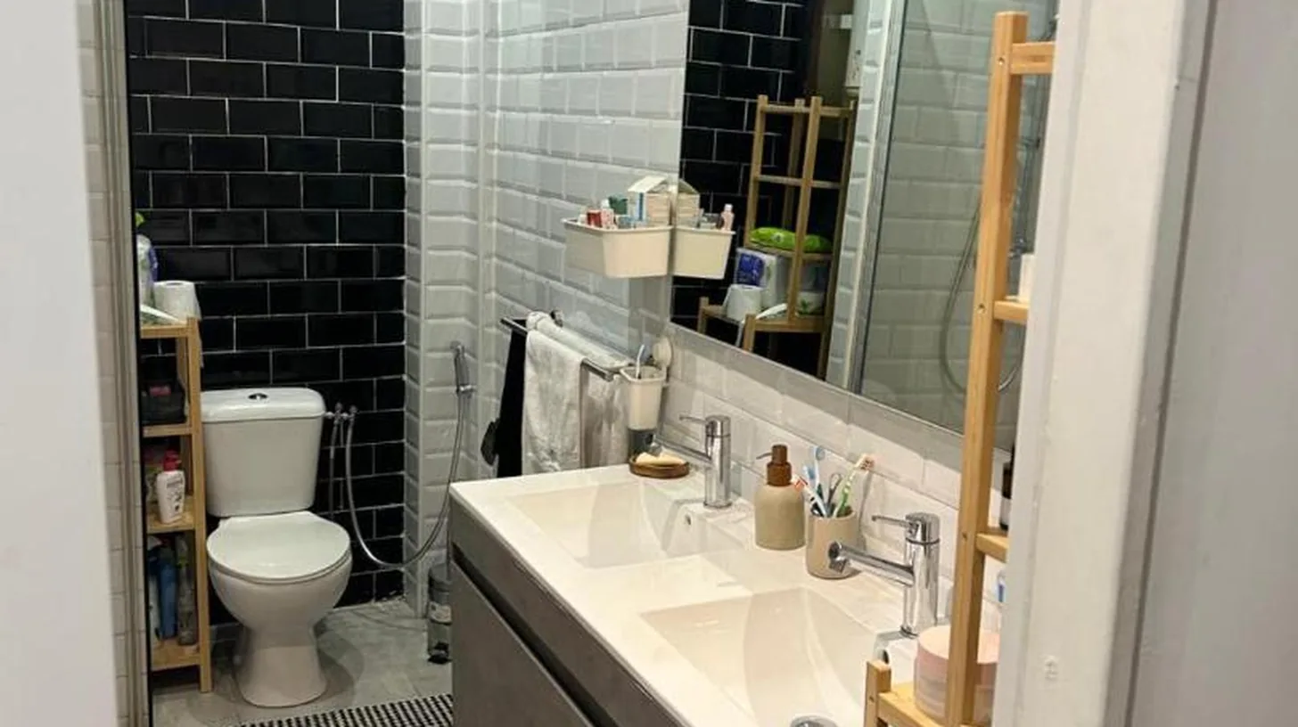 a bathroom with a sink and a toilet and a mirror at New central nice sea down town in Nice