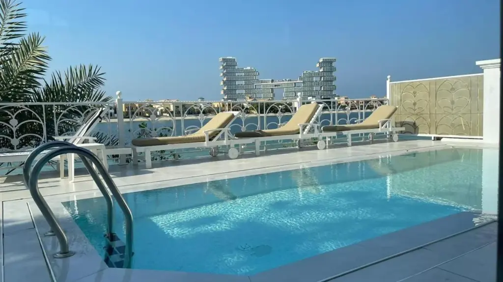 Palm Jumeirah Beachfront private pool villa 5 BR & 1 maids room with access to beach