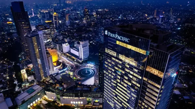 an aerial view of a city at night at Pan Pacific Jakarta in Jakarta