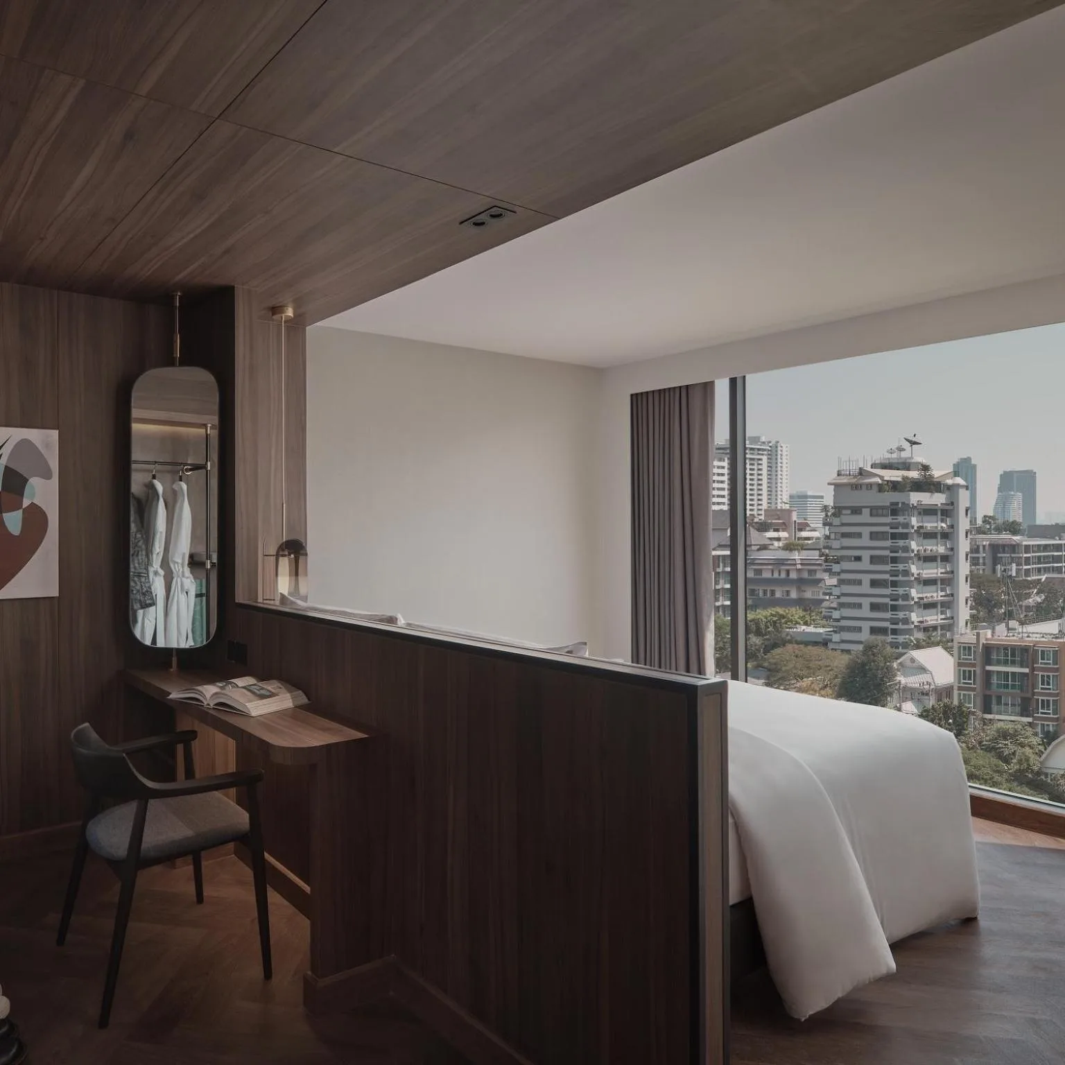 Stylish guest room at Public House Bangkok, a Member of Design Hotels