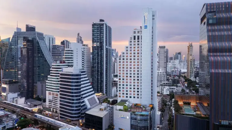 a view of a city with tall buildings at Radisson Blu Plaza Bangkok in Bangkok