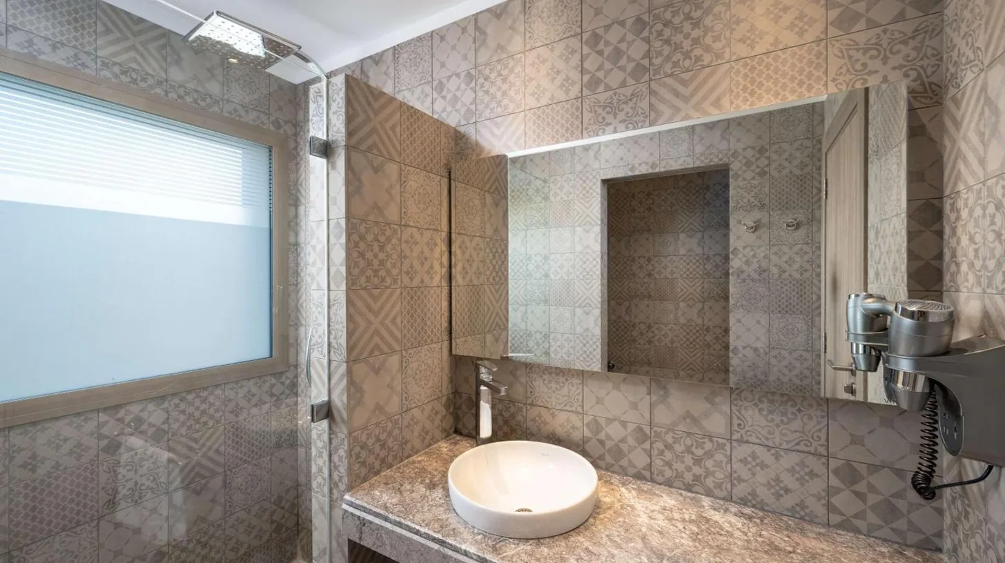 a bathroom with a toilet sitting on a counter at Radisson Blu Resort Al Hoceima in Al Hoceïma