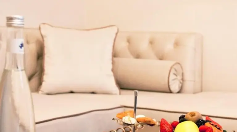 a living room with a coffee table and a couch at Riad Dar Saba - Saba's House in Tangier