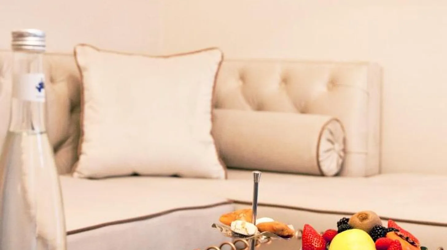 a living room with a coffee table and a couch at Riad Dar Saba - Saba's House in Tangier