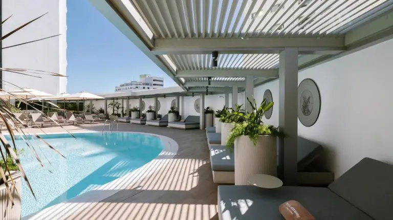 a pool on the roof of a building at Royal Hideaway Casablanca in Casablanca