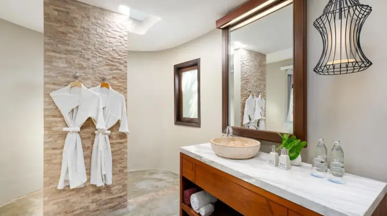 a bathroom with a sink and a mirror at SAii Koh Samui Villas - Adult only 12 plus in Choeng Mon Beach