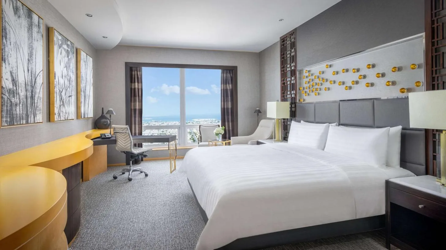 a flyer for a hormon club rooms and suites at Shangri-La Dubai in Dubai