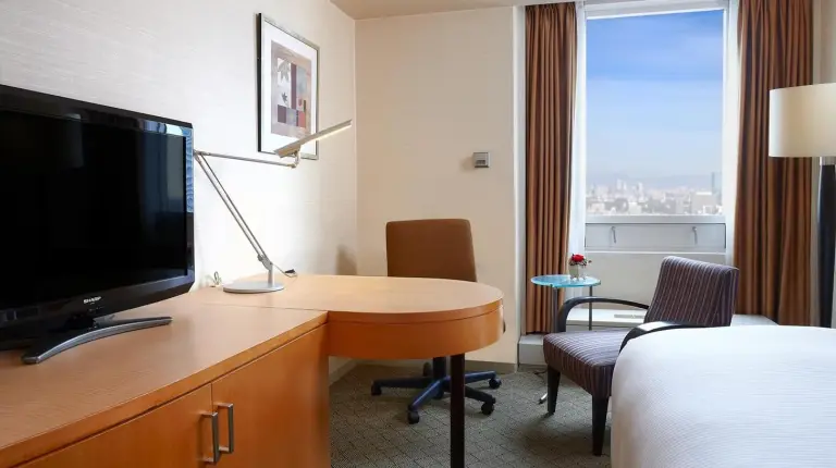 a bathroom with a sink and a shower at Sheraton Miyako Hotel Osaka in Osaka