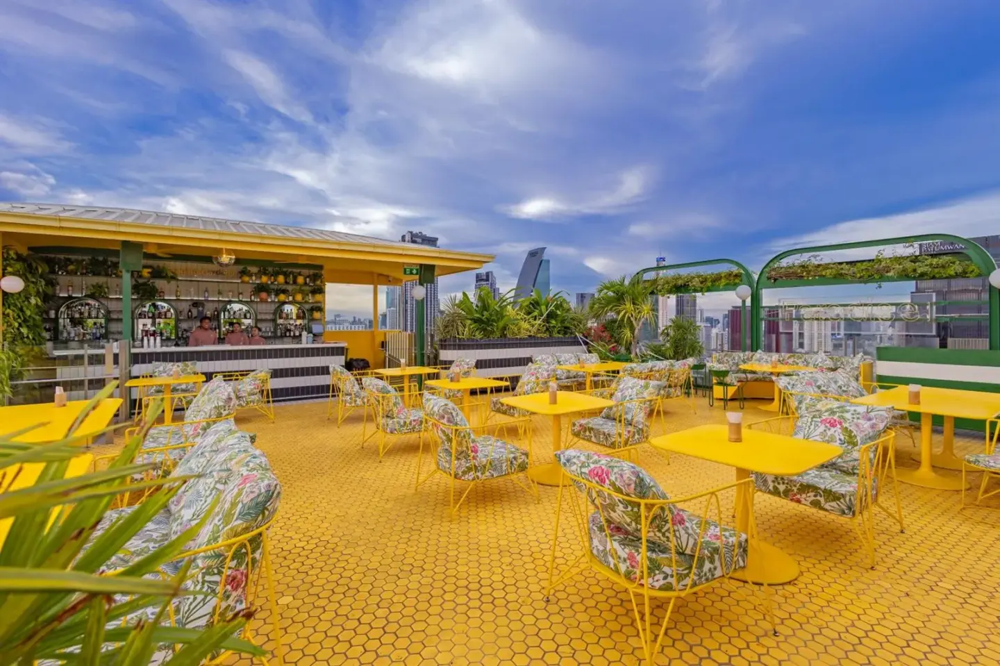 Rooftop bar at Siam At Siam Design Hotel Bangkok with vibrant decor, Thailand
