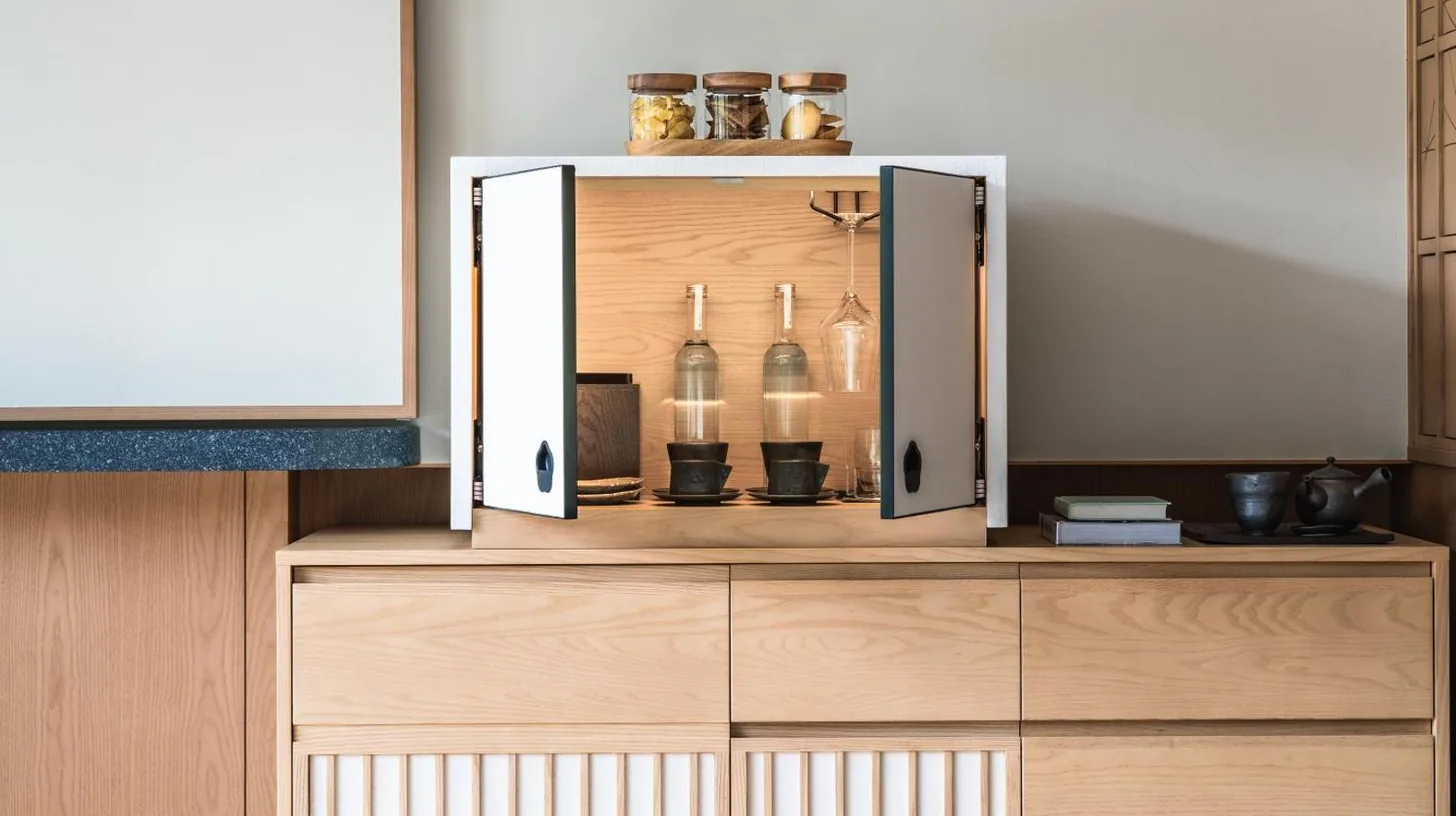 a wooden cabinet with bottles on top of it at Six Senses Kyoto in Kyoto