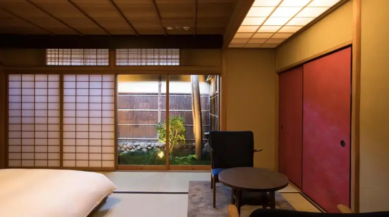 a bathroom with smoke coming out of a tub at Sowaka in Kyoto