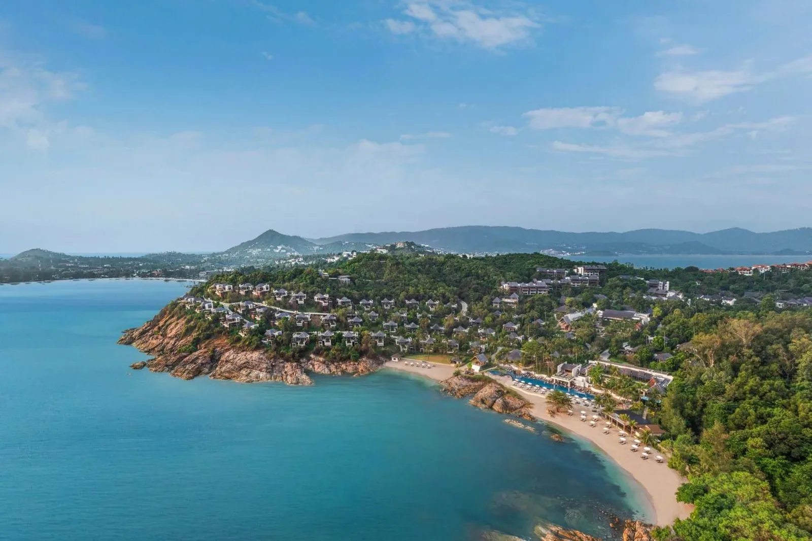 Aerial view of The Ritz-Carlton, Koh Samui showcasing the beachfront and resort layout