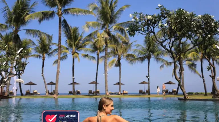 a woman in the swimming pool at a resort at The Samaya Seminyak Bali in Seminyak