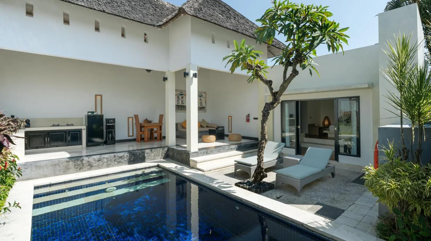 an image of a villa with a swimming pool at The Seminyak Suites Private Villas in Seminyak